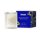 Dame Massage Oil Candle Wild Lust in glass container, blue packaging, infused with lime, ambertte, and white peach.