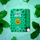 Flintts Mouth Watering Mints pack with mint leaves, offering breath-freshening spearmint flavor, vegan ingredients, and medium strength.