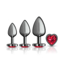 Cheeky Charms Metal Butt Plug Set in gunmetal with red heart gemstones, sizes small, medium, and large, included in anal trainer kit