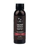 Earthly Body Kashmir Musk Massage and Body Oil 2 Oz, with hemp seed massage and body oil in a sleek bottle.