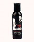 Edible Massage Lotion Cherry 2 Oz from Earthly Body in black bottle with cherry flavor illustration