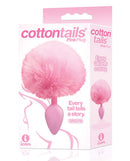 The Nines Cottontails Silicone Bunny Tail Butt Plug in Pink with soft faux fur displayed in packaging from Icon Brands