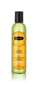 Kama Sutra Naturals Coconut Pineapple Massage Oil 8 oz bottle, luxurious skin-softening blend for intimate relaxation.