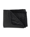 Pivot Protector waterproof sheet and furniture cover, neatly folded in black for mess-free intimate moments.