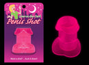 Pink glowing penis shot glass illuminated in the dark with packaging displaying "Penis Shot" text.