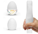 Tenga Egg Lovers Pride Edition Stroker shown in hand with product packaging and egg design.