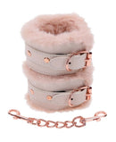 Peaches 'n CreaMe faux fur handcuffs with soft peach-colored fur and rose gold hardware for luxurious bondage play.