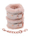 Peaches 'n CreaMe faux fur handcuffs with soft peach-colored fur and rose gold hardware for luxurious bondage play.