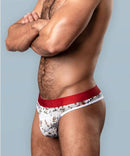 Model wearing Sheer Thong St. Dick & Co L/XL with playful prints and red waistband, showcasing comfort and style.