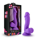 Ruse Juicy 6.5 Inch Silicone Suction Cup Dildo Purple in packaging showcasing its realistic design and bold color.