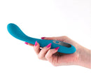 INYA Technica Rechargeable Silicone G-Spot Vibrator Blue held in a hand, showcasing its elegant design and intuitive control.