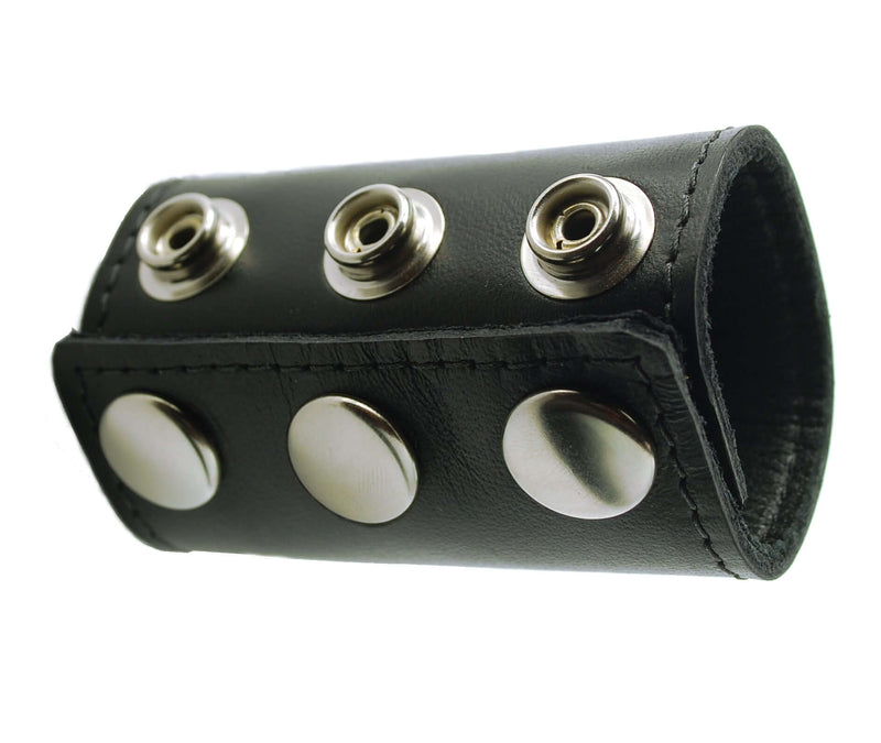 Black leather ball stretcher with snap closures for secure fit and comfort.