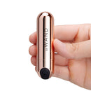 Le Wand Essentials Mini Rose Gold Bullet Vibrator held in hand, showcasing its sleek design and compact size.