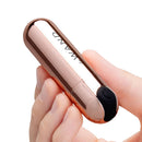 Le Wand Essentials Mini Rose Gold Bullet Vibrator held in hand for targeted clitoral stimulation.
