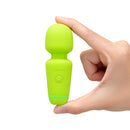 Le Wand Essentials Mini Wand Vibe Pocket-sized Vibrator held in hand, showcasing its vibrant green color and compact design.