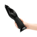 B-vibe Essentials Silicone Hand Fisting Dildo Black in hand, showcasing unique hand-shaped design for fisting play.