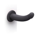 B-vibe Essentials 7 Inch Smooth Silicone Dildo Black displayed against a clean white background.