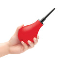 b-Vibe Essentials Hydrobulb Anal Douche 200 ml held in hand for easy anal cleansing and hygiene.
