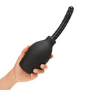 b-Vibe Essentials Enema Douche With Nozzle 310 mL Black in hand for comfortable pre-play cleansing.
