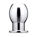 B-vibe Essentials 3 Inch Aluminum Hollow Tunnel Butt Plug with a polished silver finish and open-center design.