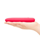 Together Mini Vibes Slim 5.5 Inch Ladyfinger Vibrator held in hand, showcasing its compact design.