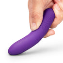 Together Mini Vibes Tip 4 Inch Pointy Bullet Vibrator in hand, showcasing the ergonomic design and targeted precision.