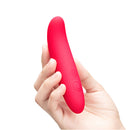 Together Mini Vibes Silhouette 5 Inch G-Spot Vibrator being held in a hand, showcasing its sleek design.