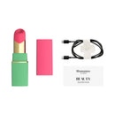 Womanizer Beauty Green & Pink Air Pulse Stimulator with charging cable and quick start guide.
