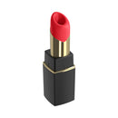 Lipstick in a black and gold case with a vibrant red bullet, showcasing a stylish design.