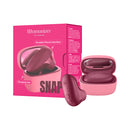 Womanizer Snap Crushed Berry Clitoral Stimulator in charging case with sleek design and rich berry color.