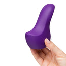 We-Vibe Shared Touch Couples Grinding Vibrator Purple held in hand, showcasing its ergonomic design.