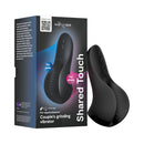 We-Vibe Shared Touch Couples Vibrator Black in packaging showcasing its design for couples' pleasure.