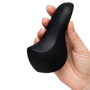 We-Vibe Shared Touch Couples Vibrator Black held in a hand demonstrating its ergonomic design for intimate use.