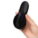 We-Vibe Shared Touch Couples Vibrator Black held in hand showcasing ergonomic design and controls.