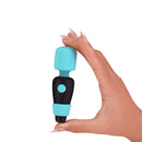 PalmPower Pocket Mini Massager Teal held in a hand, showcasing its compact design and vibrant color.