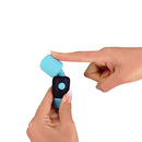 PalmPower Pocket Mini Massager Teal being held and prepared for use, showcasing its compact design and vibrant color.