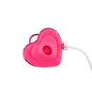 Adam & Eve Hearts-a-flutter Vibrator in a heart shape with a charging cord, designed for discreet pleasure.