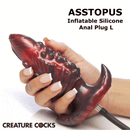 Creature Cocks Tentacle Inflatable Silicone Anal Plug Large held in hand, showcasing its adventurous design.