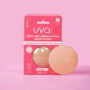 UVA Caramel Non-Adhesive Round Nipple Covers package on a pink background.