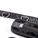 Sei Mio The Bottom Line Under The Bed Pillory components showcasing soft restraint straps and D-rings.