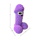 Cock Blocks Bricked Up 3D Penis Puzzle 3265 Pieces displayed in vibrant purple with playful features.