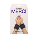 Merci Velvet Wrist Cuffs Violet and Black packaging featuring hands with cuffs in violet and black.
