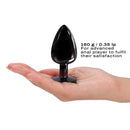Dorcel Diamond Butt Plug Black Large held in hand, designed for experienced anal players seeking satisfaction.