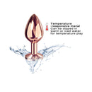 Dorcel Diamond Anal Plug Rose Gold Medium surrounded by water, showcasing its temperature-responsive design.