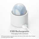 Tenga Iroha Temari Hana Clitoral Vibrator with USB charging base and elegant design.