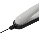 Tenga Iroha Mai Tsuru HapticWave Vibrator charging design with sleek white finish and black base.