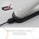 Tenga Iroha Mai Tsuru HapticWave Vibrator on charging base with LED indicator.