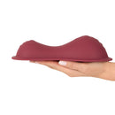 Vibepad Intense 2 Remote Grinding Pad Vibrator shown in hand for hands-free pleasure and control over intensity.