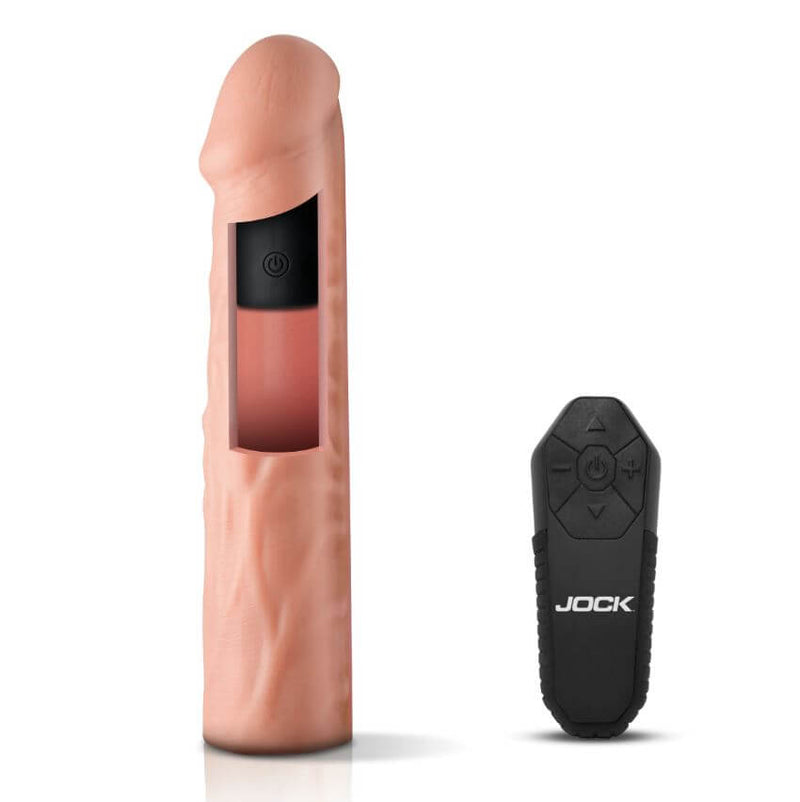 Jock Enhancers Vibrating Penis Extension Sleeve 1.5 inches Vanilla next to a black remote control for vibration settings.