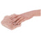 Peaches N Creame Spiked Glove Sensory with a hand gliding over a plush faux fur surface.